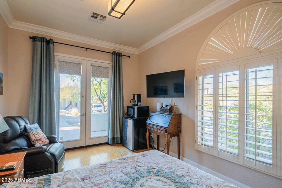 2347 West River Rock Court Phoenix, AZ 85086 - Photo 24 of 25 a living room with furniture and a flat screen tv