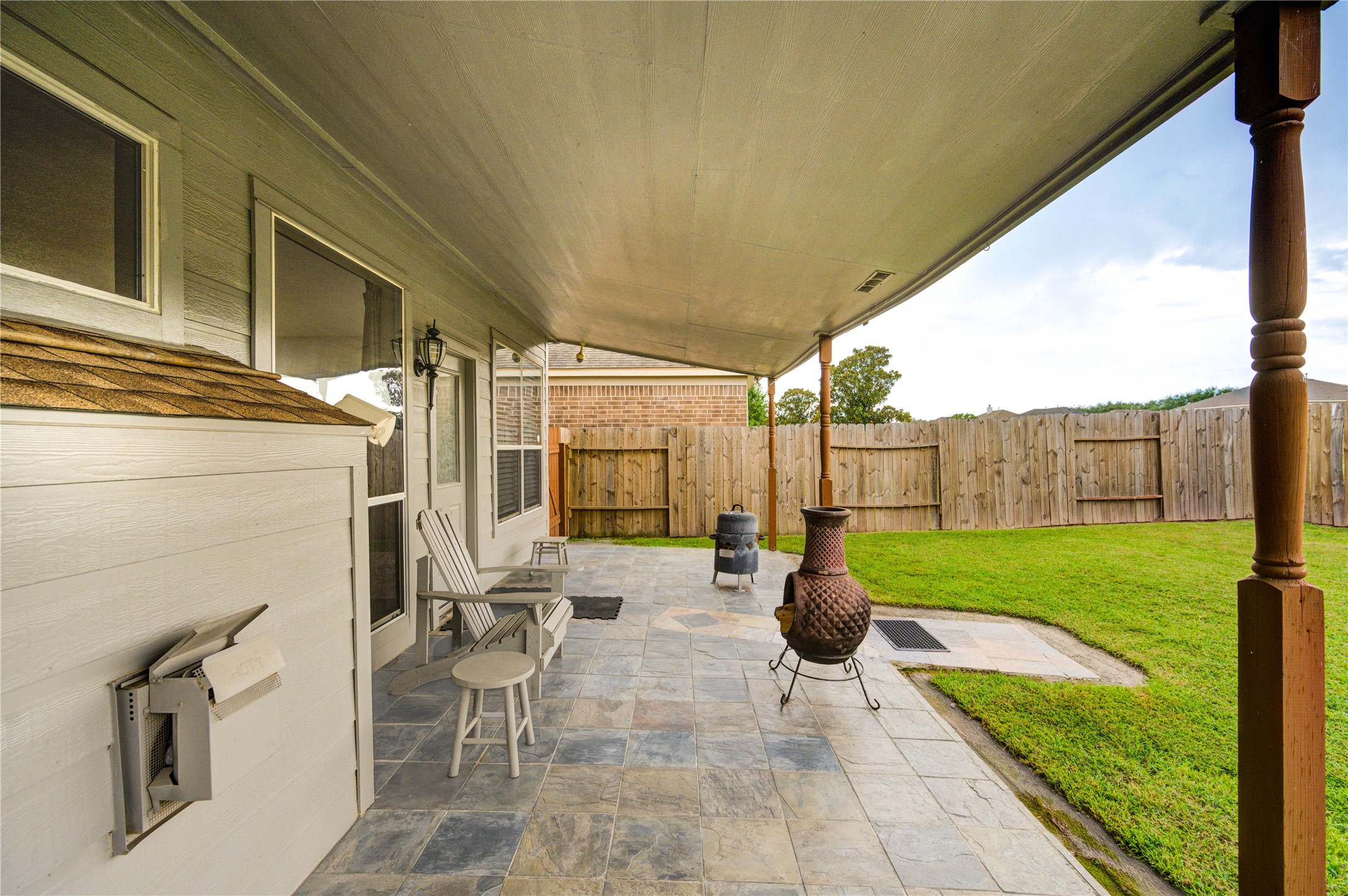16730 Spring Barker Drive Cypress, TX 77429 - Photo 49 of 50 a view of a backyard with sitting area