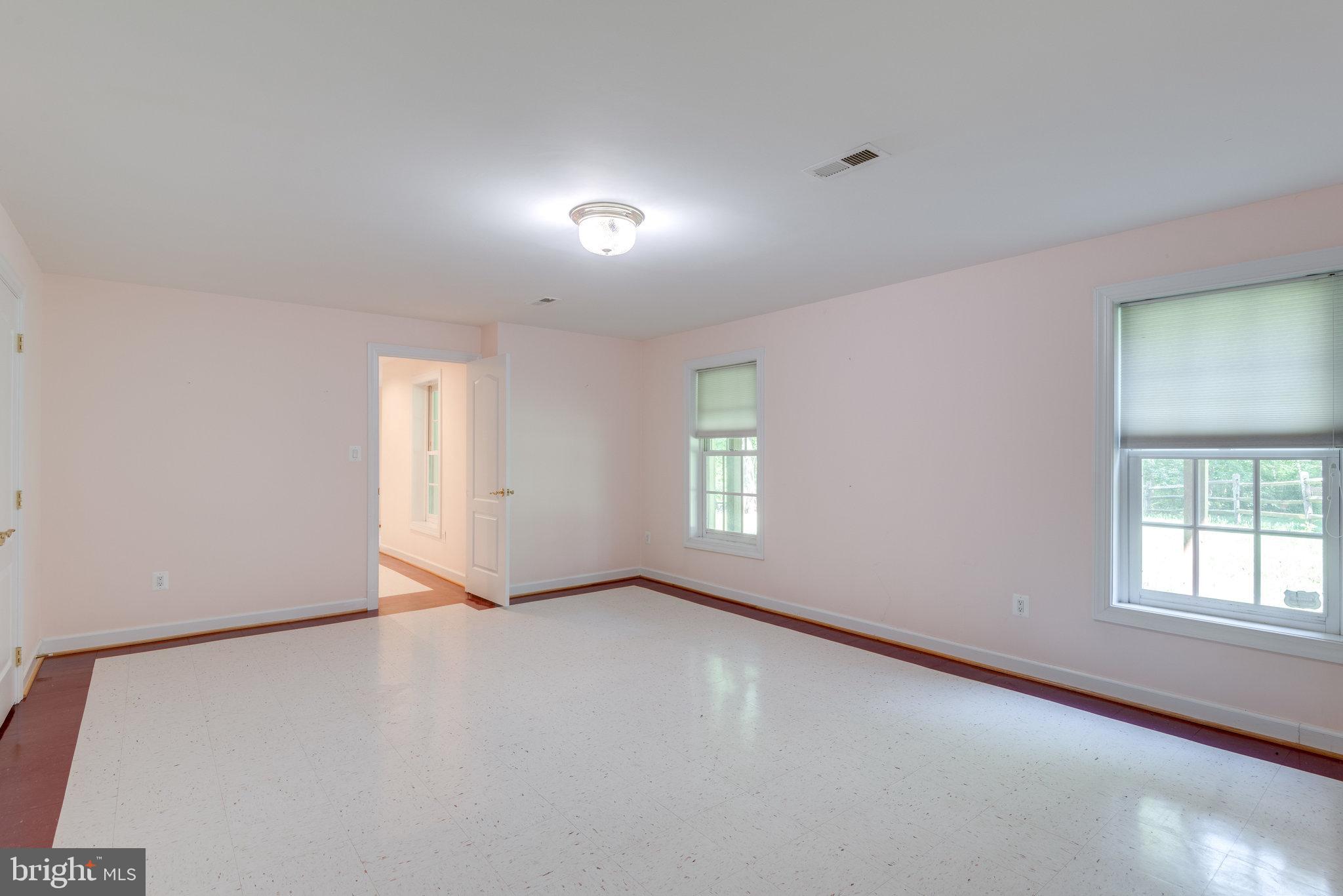 12104 North Walnut Branch Road Reston, VA 20194 - Photo 55 of 70 Bedroom 5 has full size windows.