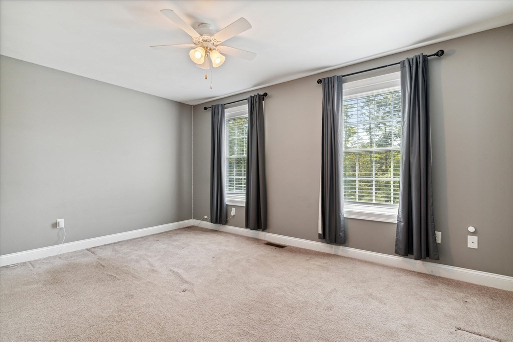 54 Lane Road Derry, NH 03038 - Photo 15 of 34 a view of an empty room with a window