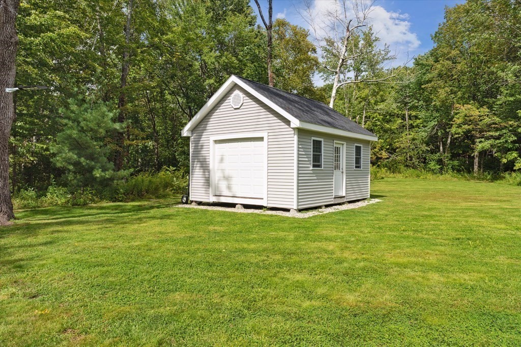 54 Lane Road Derry, NH 03038 - Photo 23 of 34 a view of a house with a yard