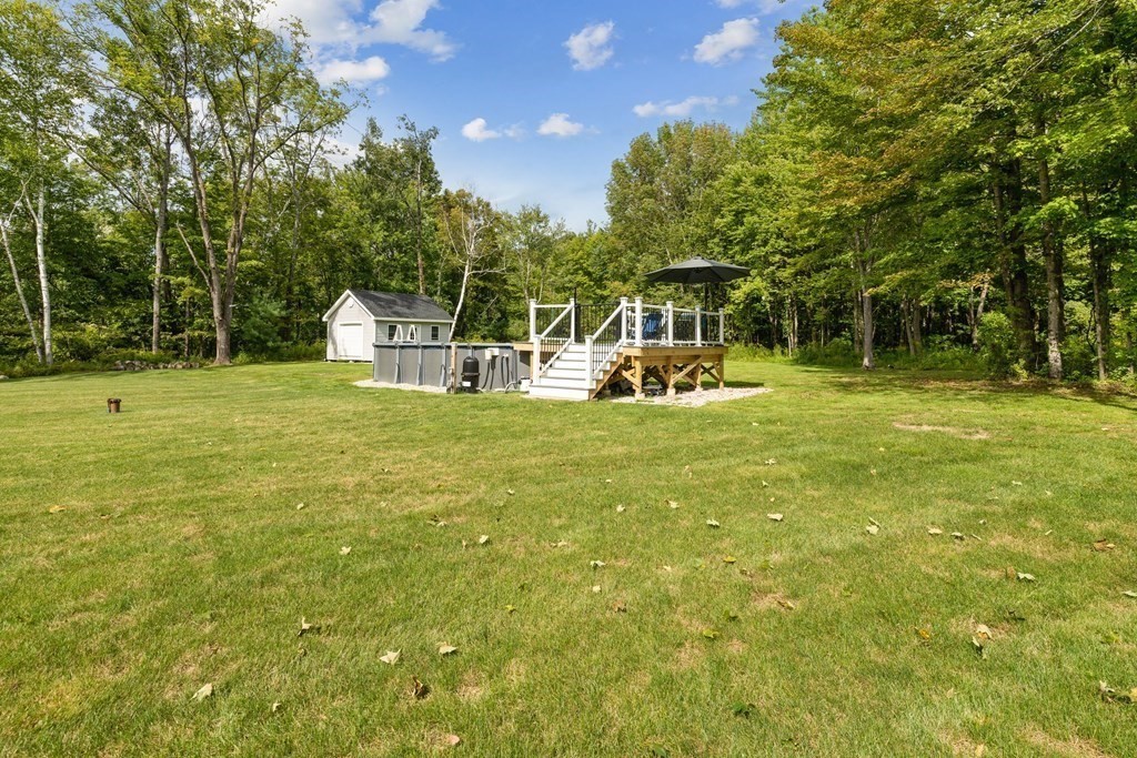 54 Lane Road Derry, NH 03038 - Photo 25 of 34 a view of a golf course with chairs