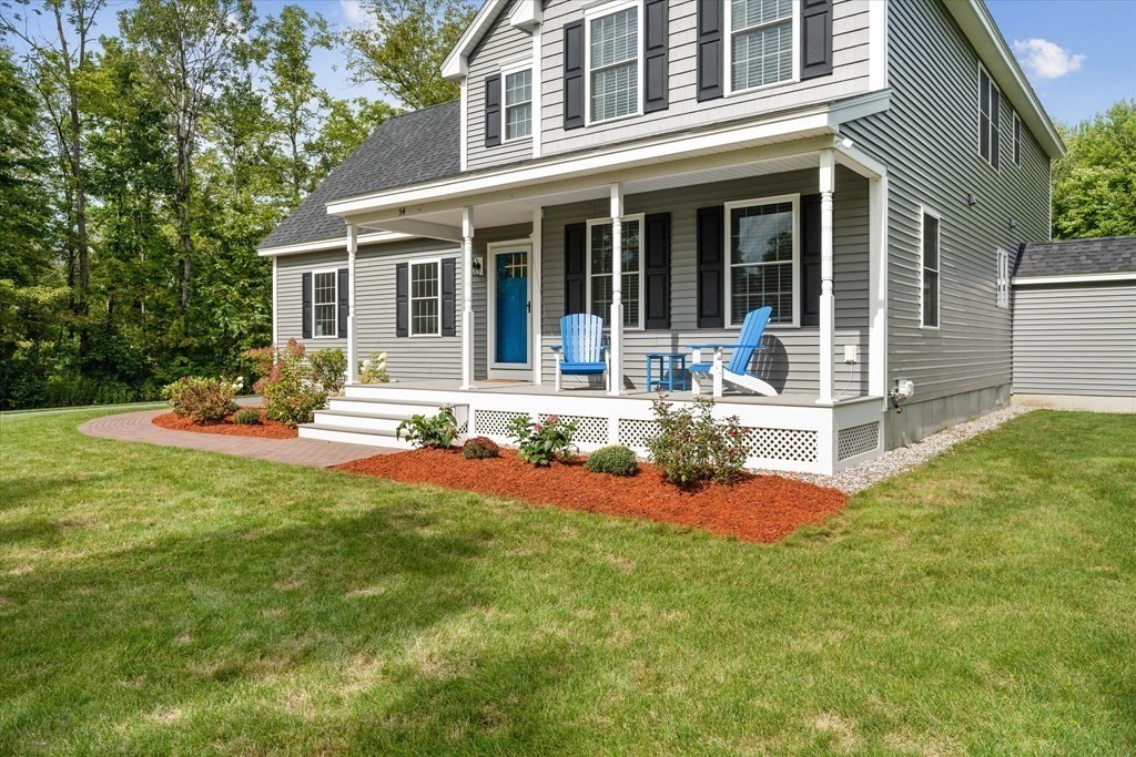 54 Lane Road Derry, NH 03038 - Photo 32 of 34 front view of a house with a yard and porch