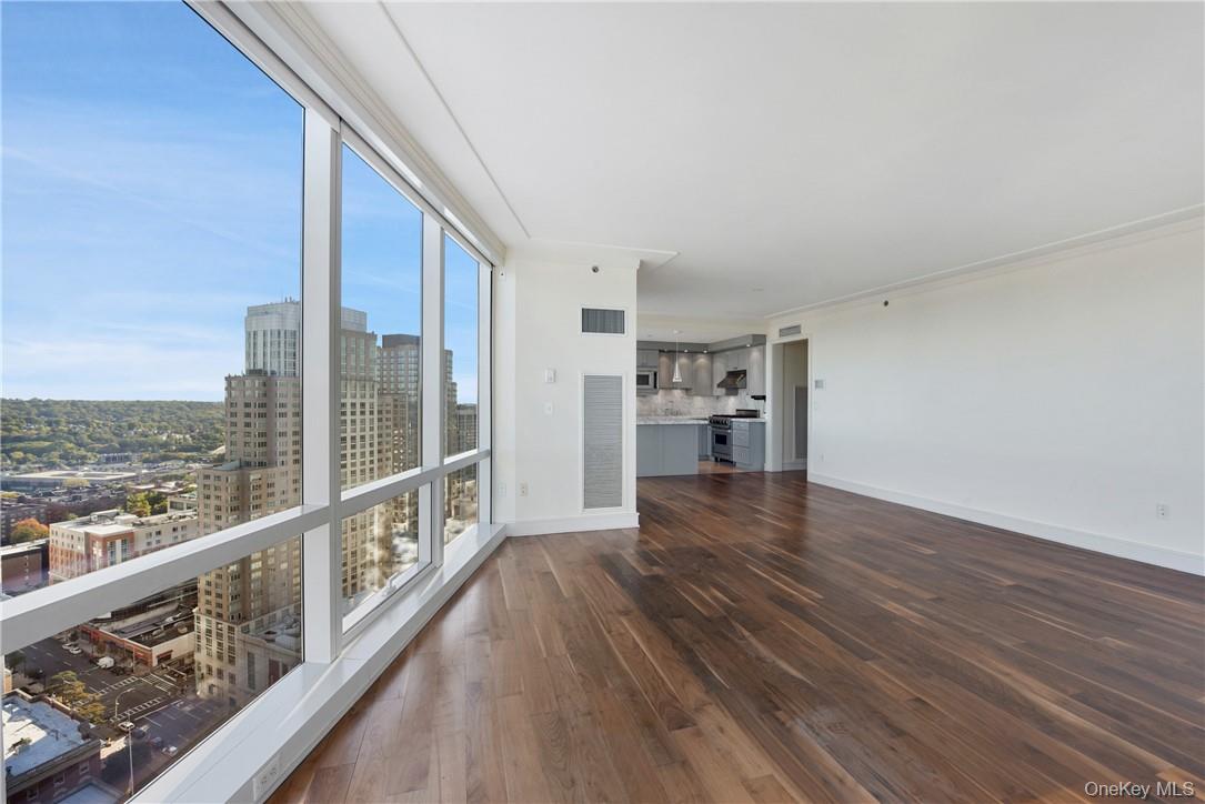 1 Renaissance Square, Unit V4G White Plains, NY 10601 - Photo 5 of 17 a view of a balcony with wooden floor
