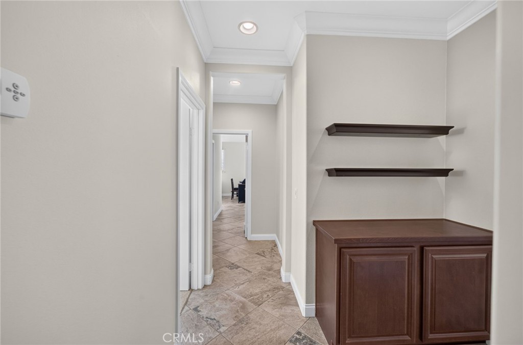 31749 Country View Road Temecula, CA 92591 - Photo 28 of 68 a view of a hallway with wooden floor