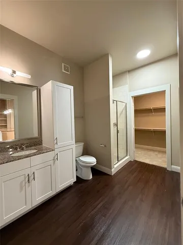a view of a kitchen with a sink and a stove top oven