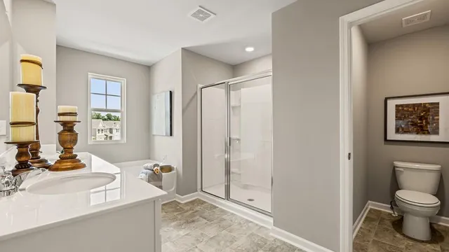 a living room with furniture and a wall painting