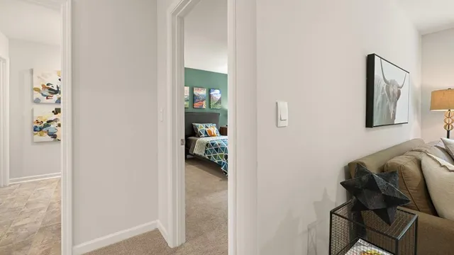 a white toilet sitting next to a bath tub