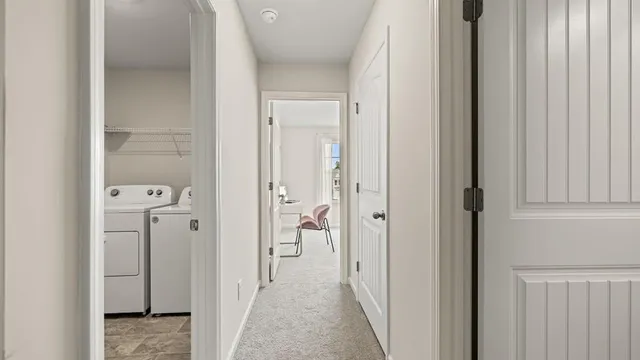 a front view of a house with a yard table and chairs