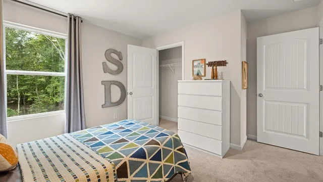 a view of a swimming pool with a chair and couches