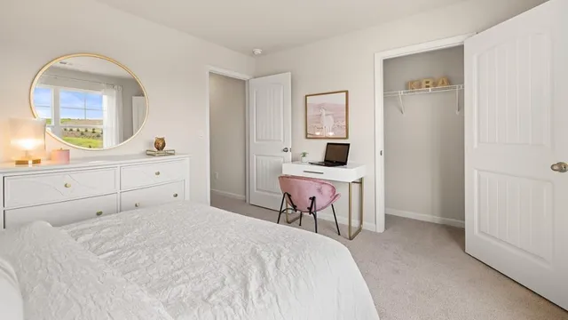 a view of a tennis court with large trees