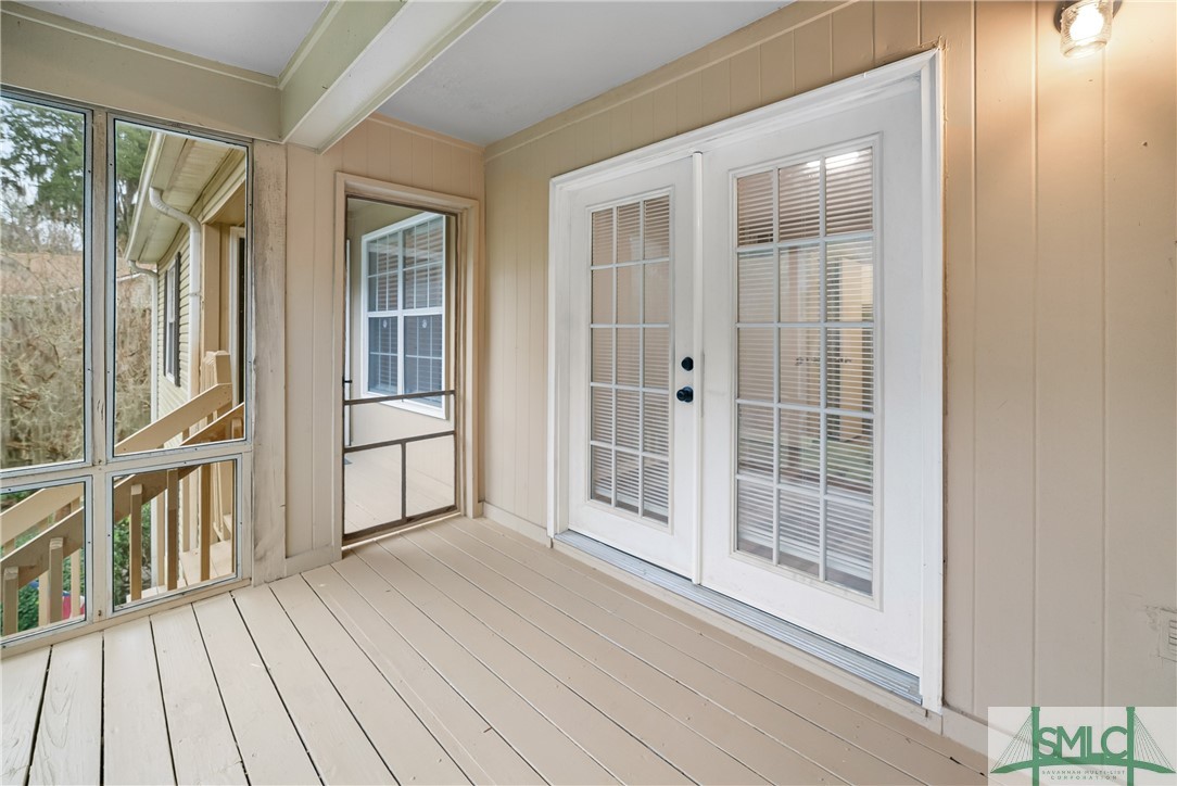 401 North Cromwell Road, Unit T7 Savannah, GA 31410 - Photo 20 of 41 Screened porch off of the