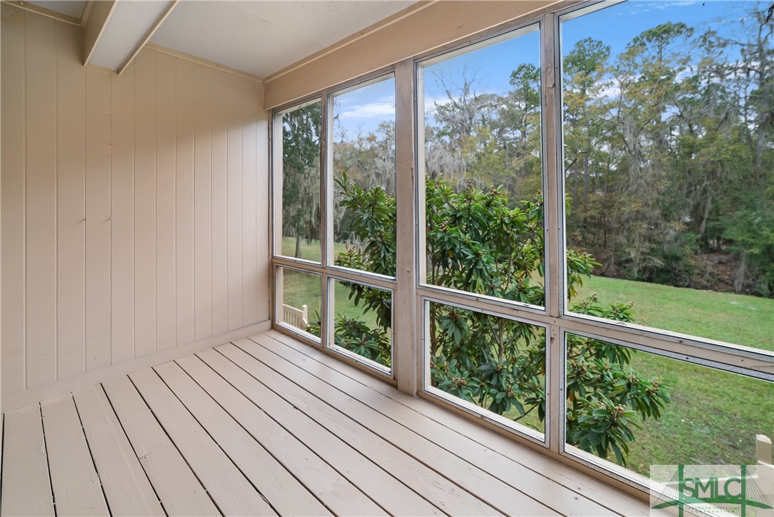 401 North Cromwell Road, Unit T7 Savannah, GA 31410 - Photo 21 of 41 Beautiful view of green space from your screened p