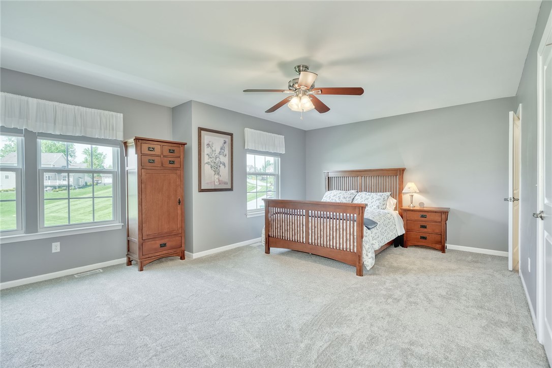 32 Ashlyn Rise Penfield, NY 14450 - Photo 26 of 50 Huge Primary bedroom with new carpeting, walk-in c