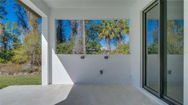an aerial view of residential house with outdoor space