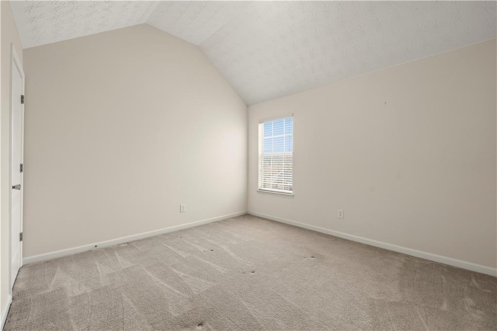 2708 Oakmont Way Monroe, GA 30656 - Photo 28 of 40 an empty room with a window