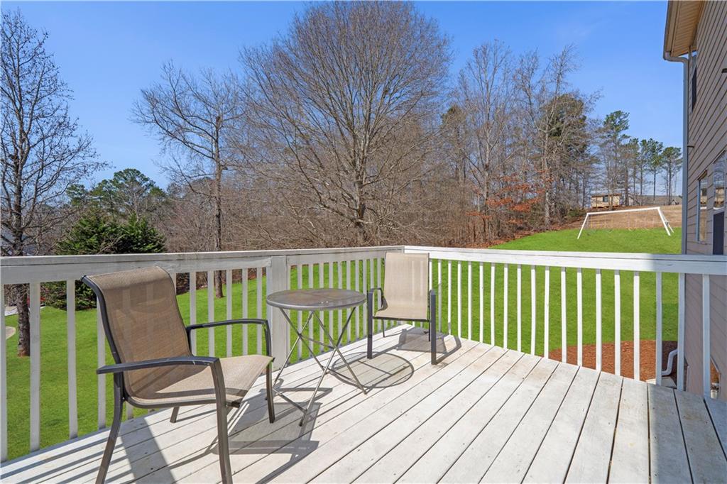2708 Oakmont Way Monroe, GA 30656 - Photo 32 of 40 a view of a chairs on the roof deck