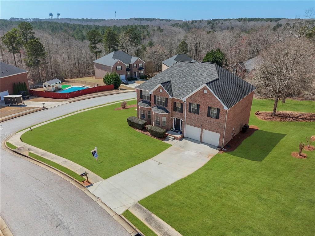 2708 Oakmont Way Monroe, GA 30656 - Photo 36 of 40 an aerial view of a house with pool