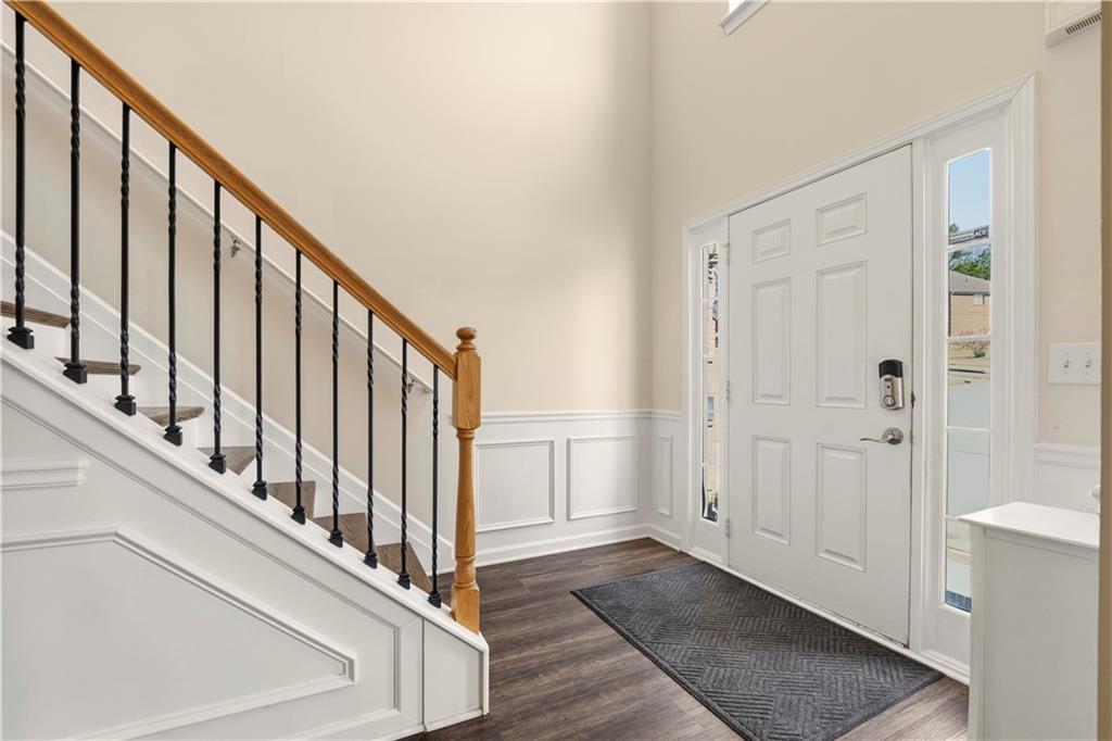 2708 Oakmont Way Monroe, GA 30656 - Photo 4 of 40 a view of an entryway with staircase