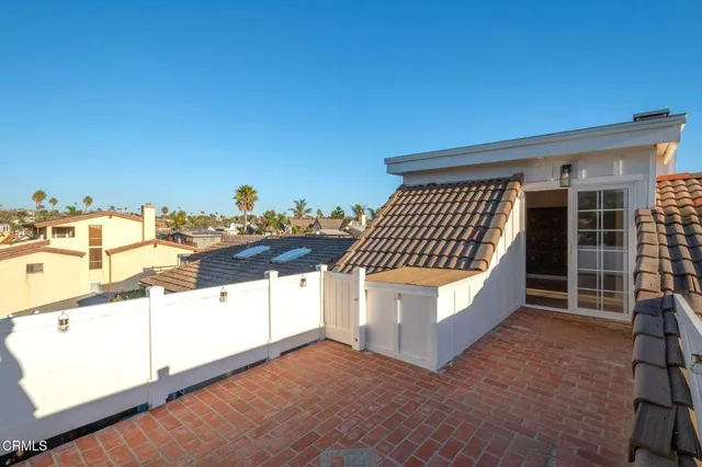 a view of balcony with two chairs
