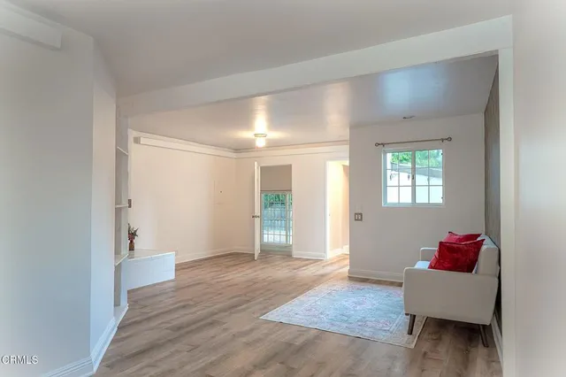 a view of livingroom with furniture and wooden floor
