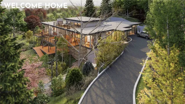 a view of a house with a yard