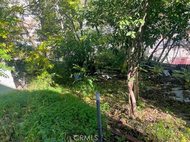 a view of lake with green space