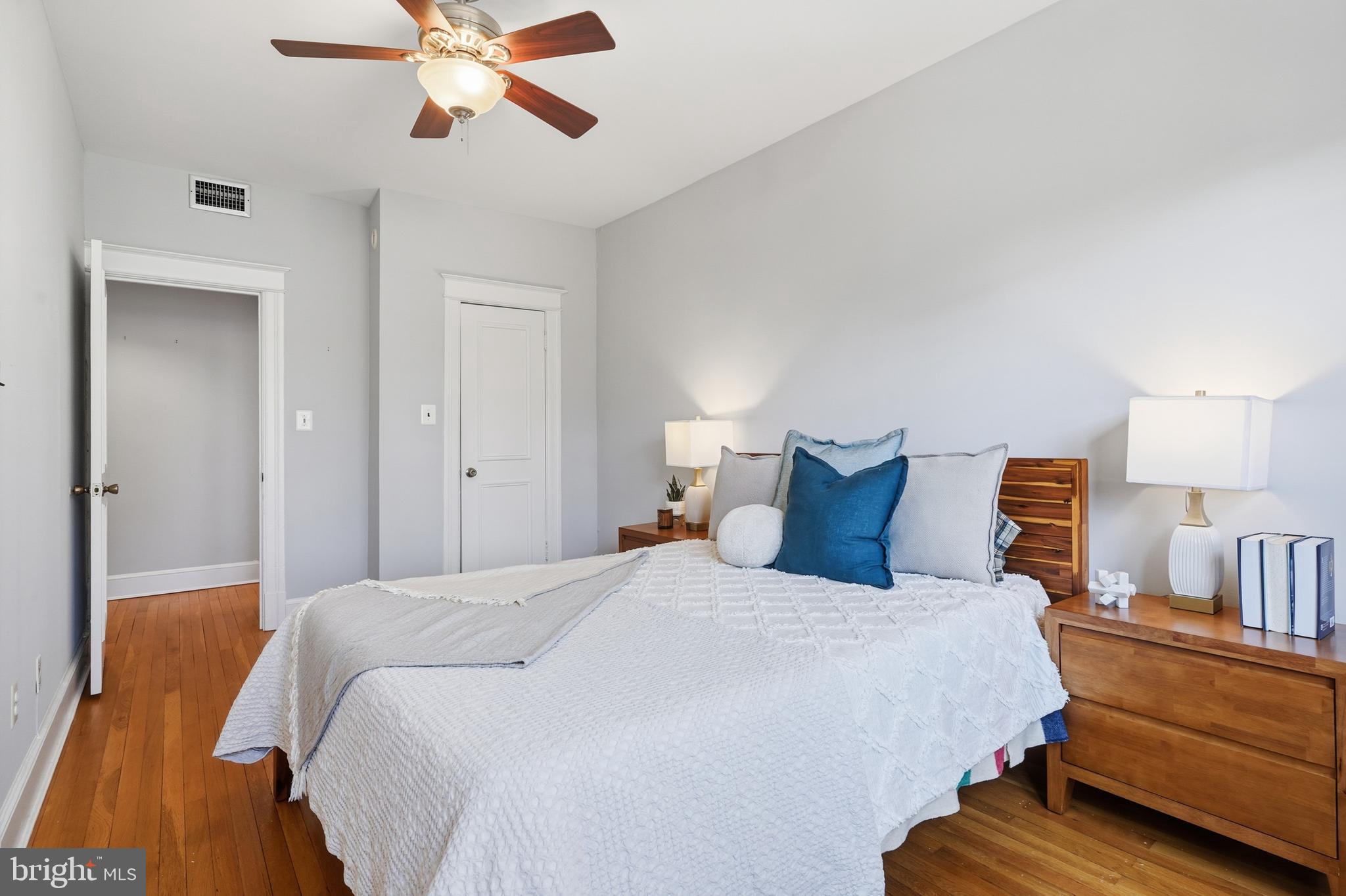 18 9th Street Northeast, Unit 302 Washington, DC 20002 - Photo 17 of 38 a bedroom with bed and window