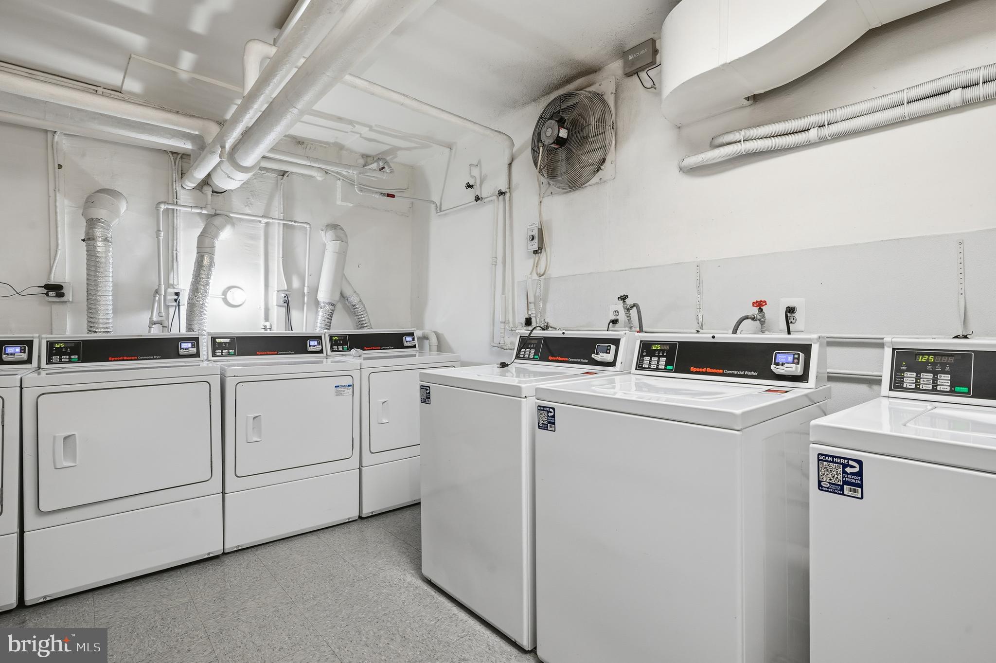 18 9th Street Northeast, Unit 302 Washington, DC 20002 - Photo 28 of 38 a kitchen with cabinets appliances and a sink