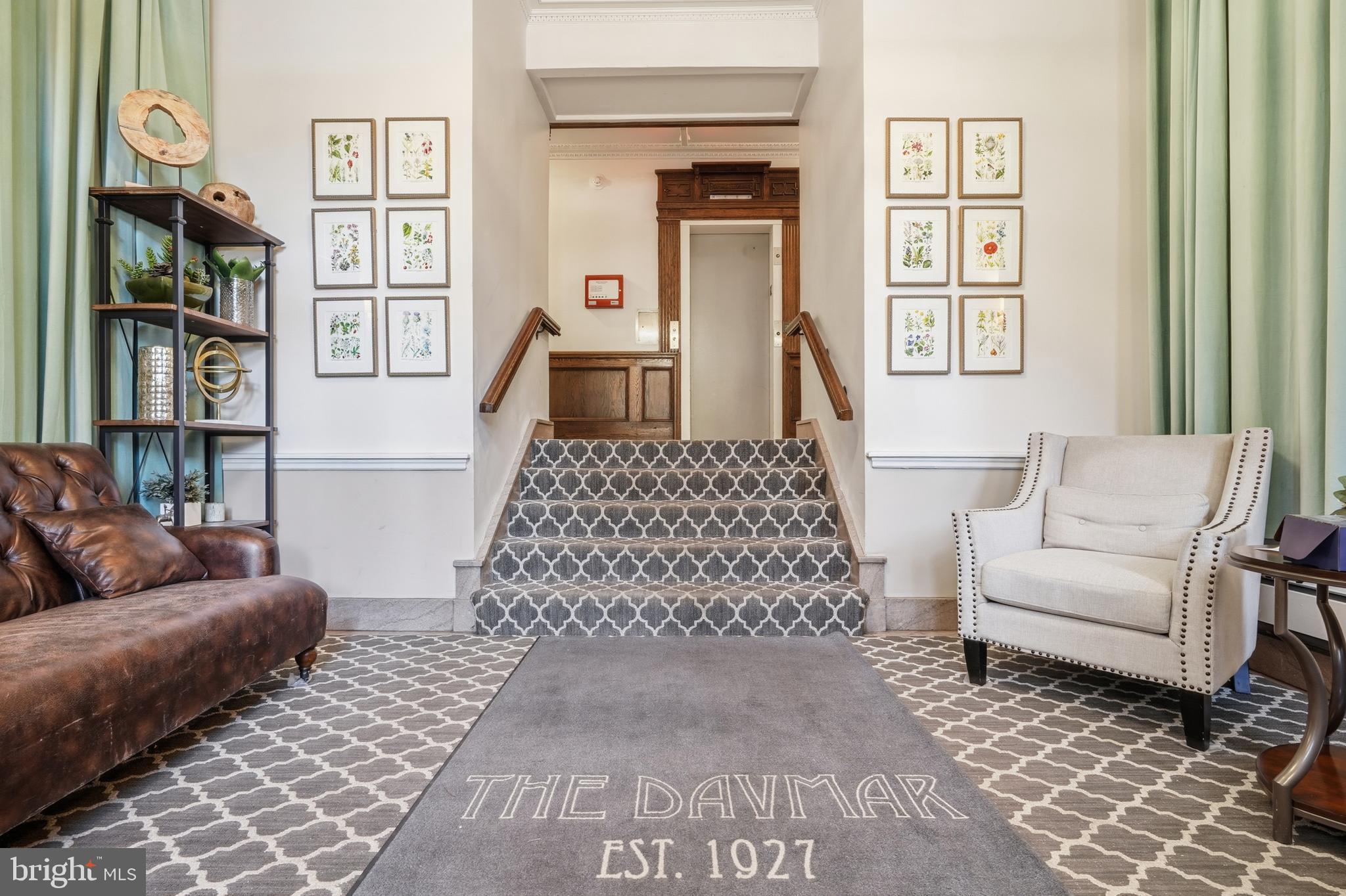 18 9th Street Northeast, Unit 302 Washington, DC 20002 - Photo 6 of 38 a living room with furniture and a couch
