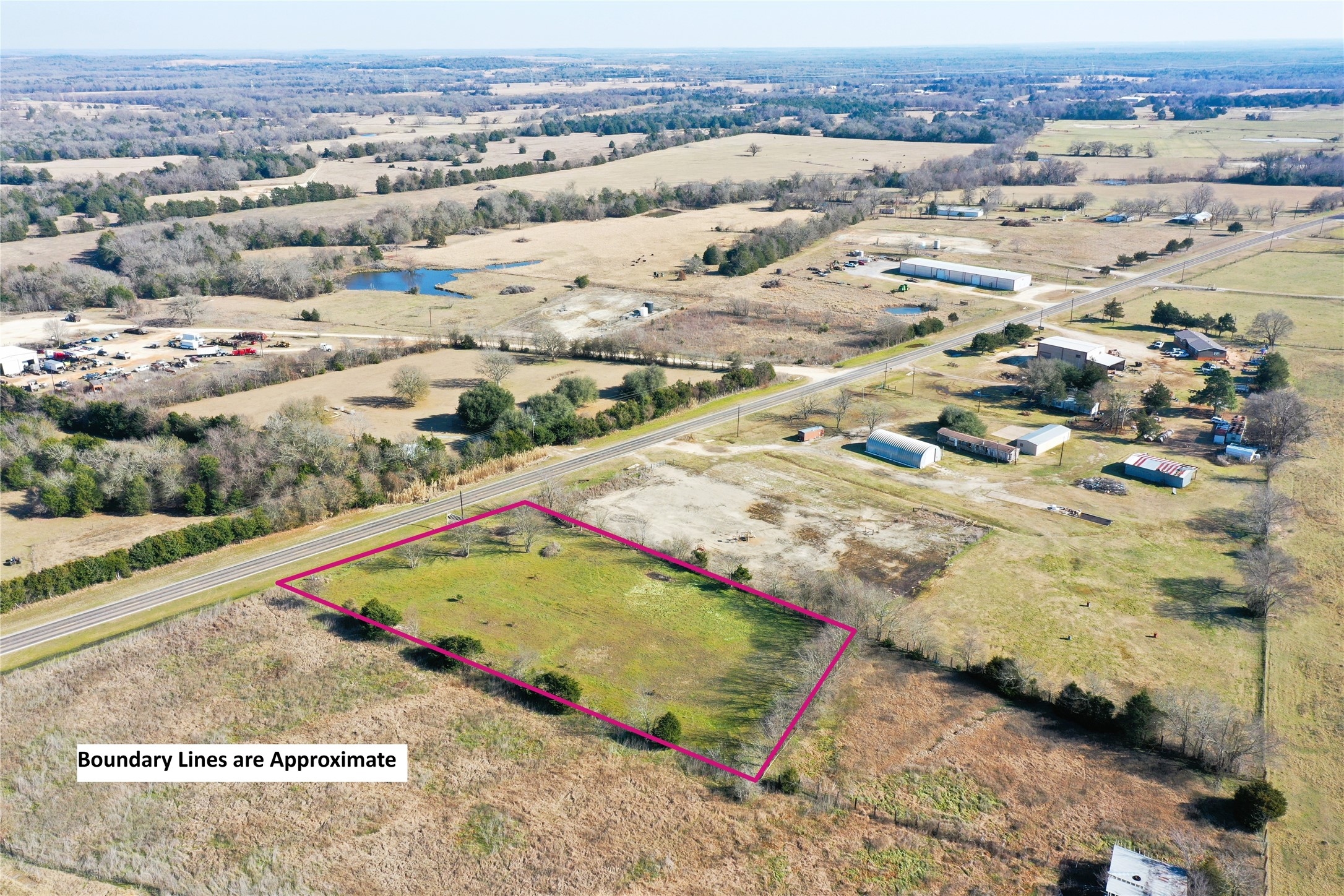 75 State Highway 75 South Teague, TX 75860 - Photo 2 of 6 an aerial view of residential houses with outdoor space