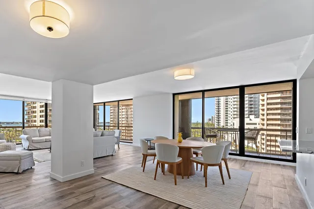 a dining room with furniture window wooden floor