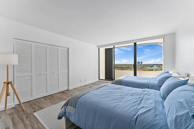 a bathroom with a shower and a toilet