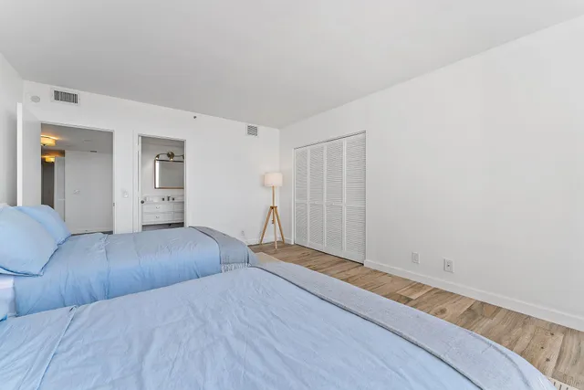 a bathroom with a sink a mirror and a toilet