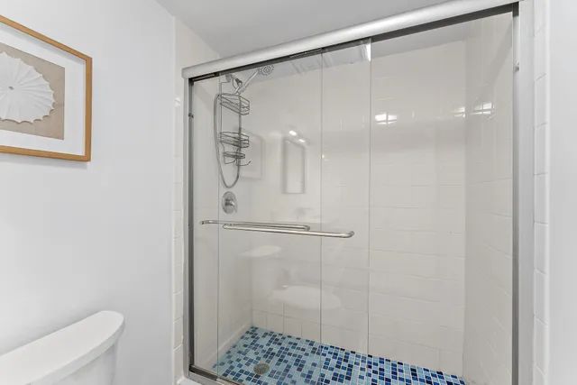 a view of a balcony with furniture