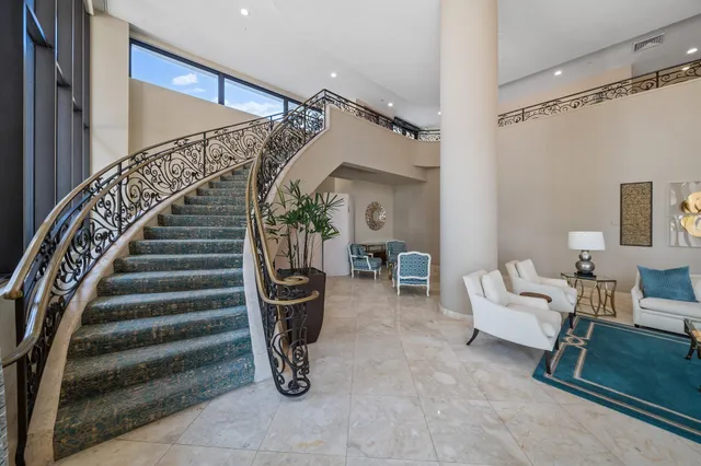 a view of a dining room with furniture and a table