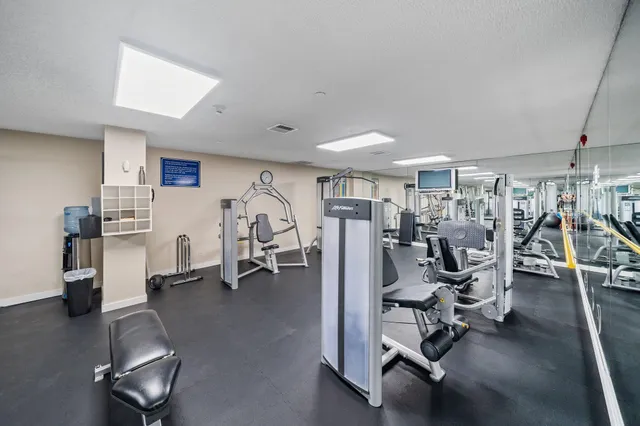 a view of a room with furniture and a garage