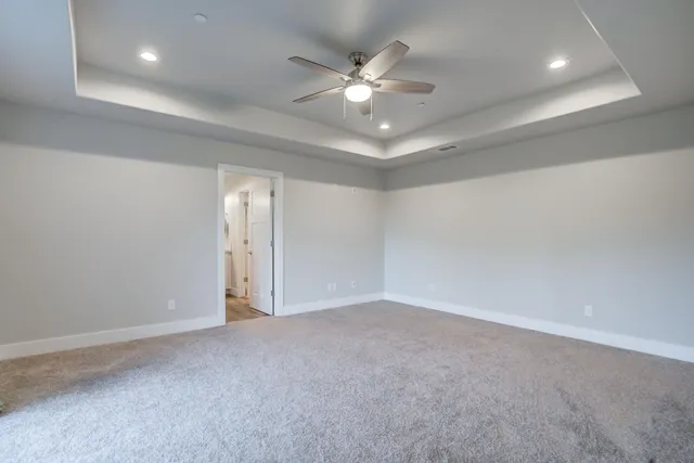 a bathroom with a double vanity sink mirror and shower