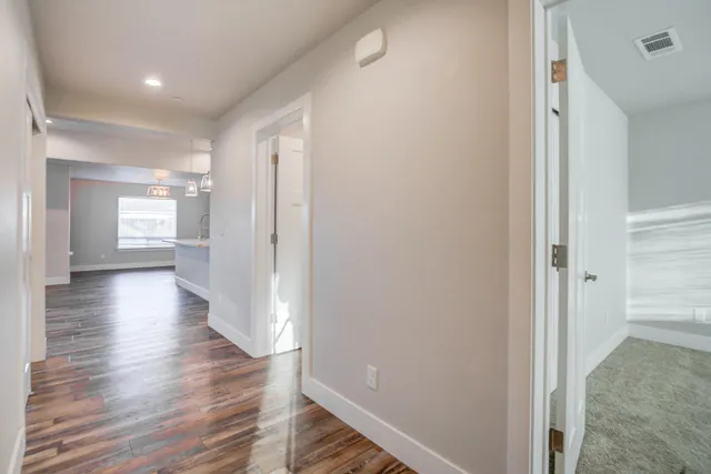 a view of a city street from a balcony