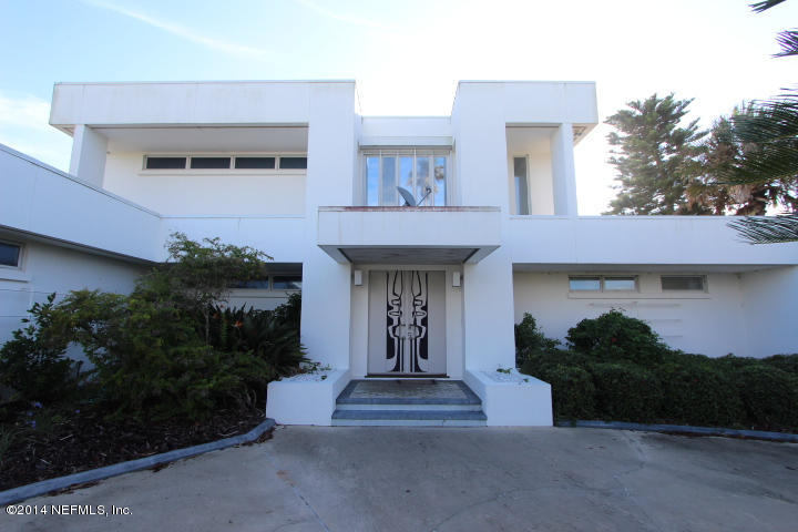 10 Jimmy Mark Place St. Augustine, FL 32080 - Photo 1 of 8 a view of a building with potted plants
