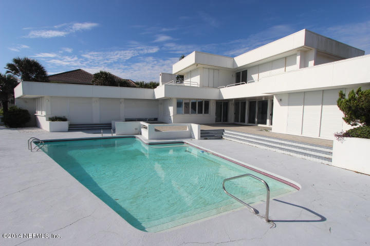 10 Jimmy Mark Place St. Augustine, FL 32080 - Photo 6 of 8 a swimming pool with outdoor seating and yard