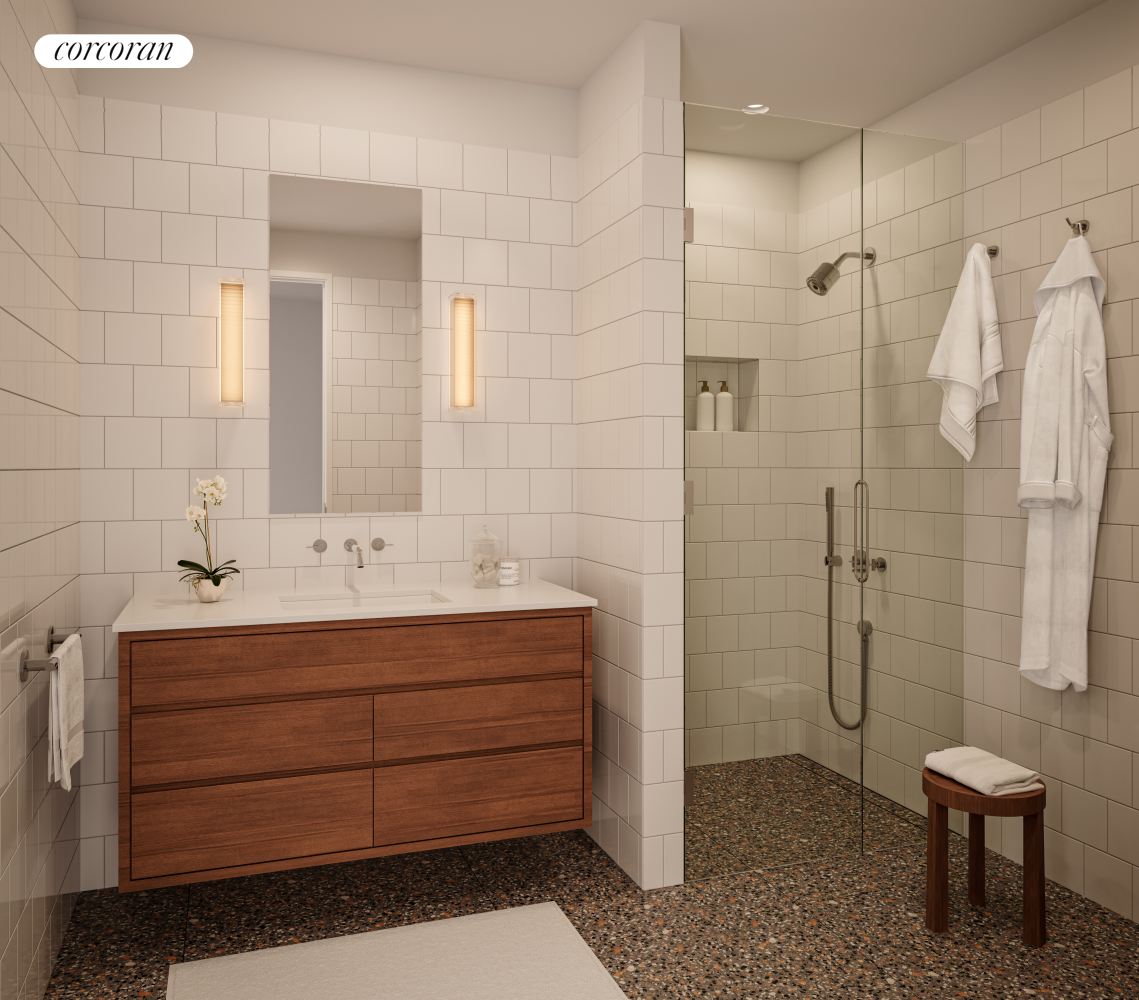 83 Thompson Street, Unit PH Manhattan, NY 10012 - Photo 11 of 20 a bathroom with a shower toilet and sink