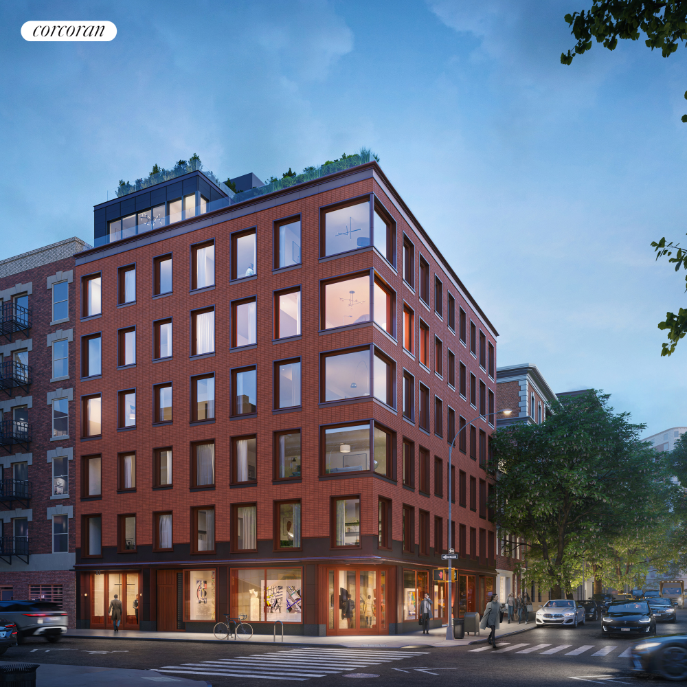 83 Thompson Street, Unit PH Manhattan, NY 10012 - Photo 16 of 20 a view of a tall building