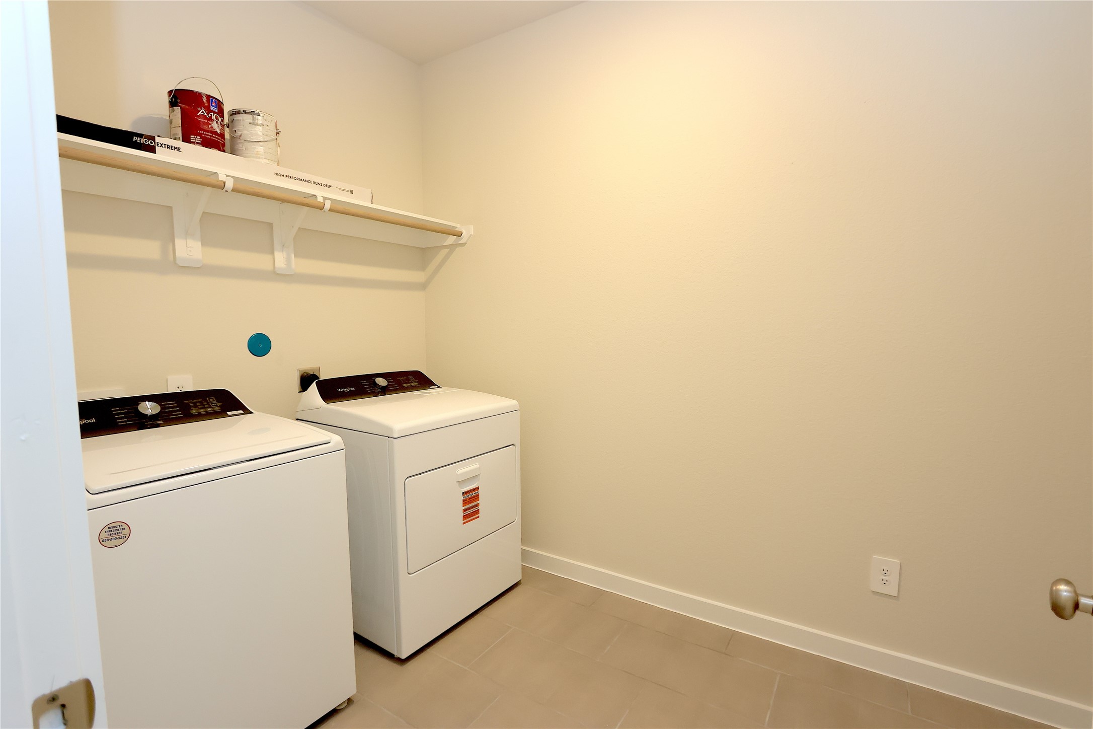 1480 Waggoner Rnch Trail Conroe, TX 77301 - Photo 17 of 18 a utility room with dryer and washer