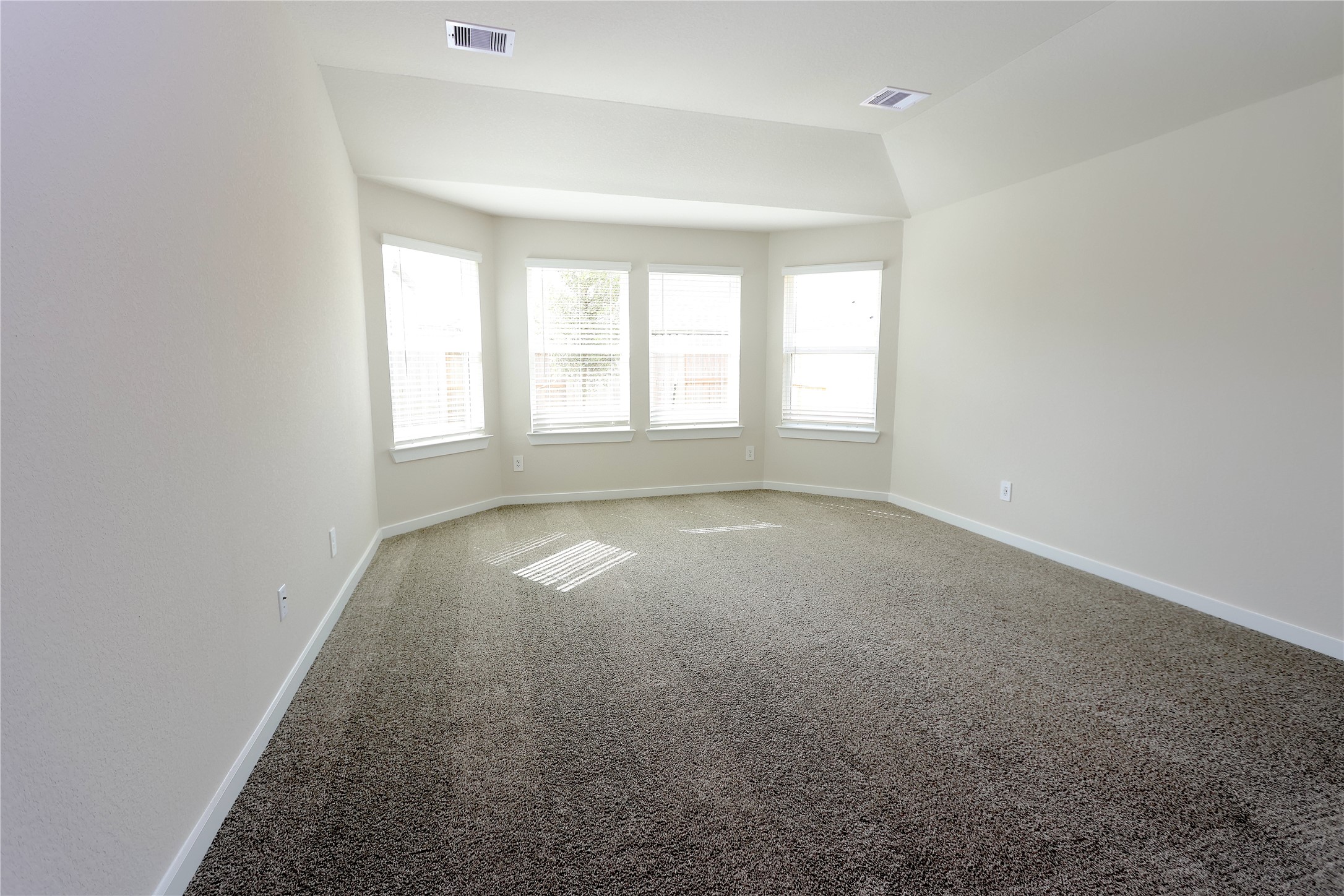 1480 Waggoner Rnch Trail Conroe, TX 77301 - Photo 3 of 18 an empty room with a empty space and windows