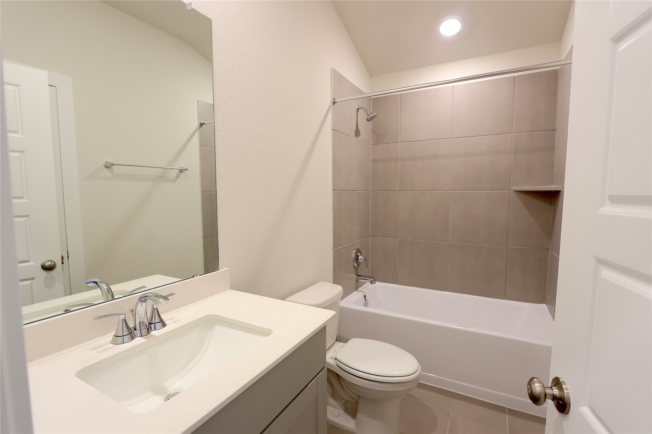 1480 Waggoner Rnch Trail Conroe, TX 77301 - Photo 8 of 18 a bathroom with a sink a toilet and shower