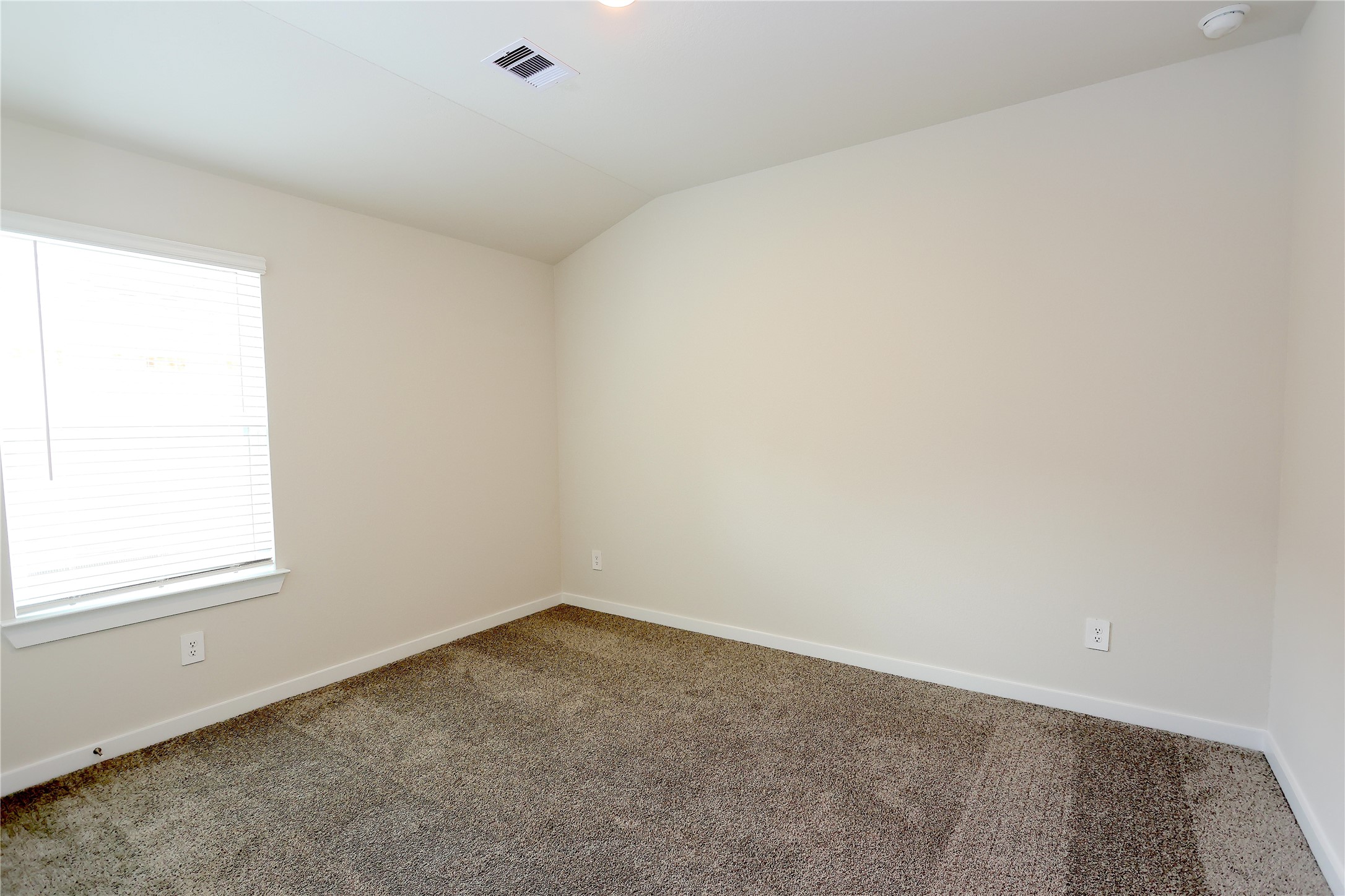 1480 Waggoner Rnch Trail Conroe, TX 77301 - Photo 9 of 18 an empty room with a window
