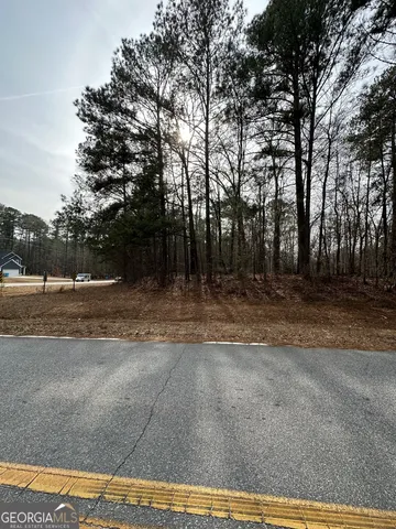 a view of road with trees