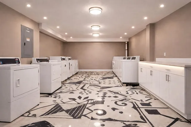 a very nice looking dining room with wooden floor
