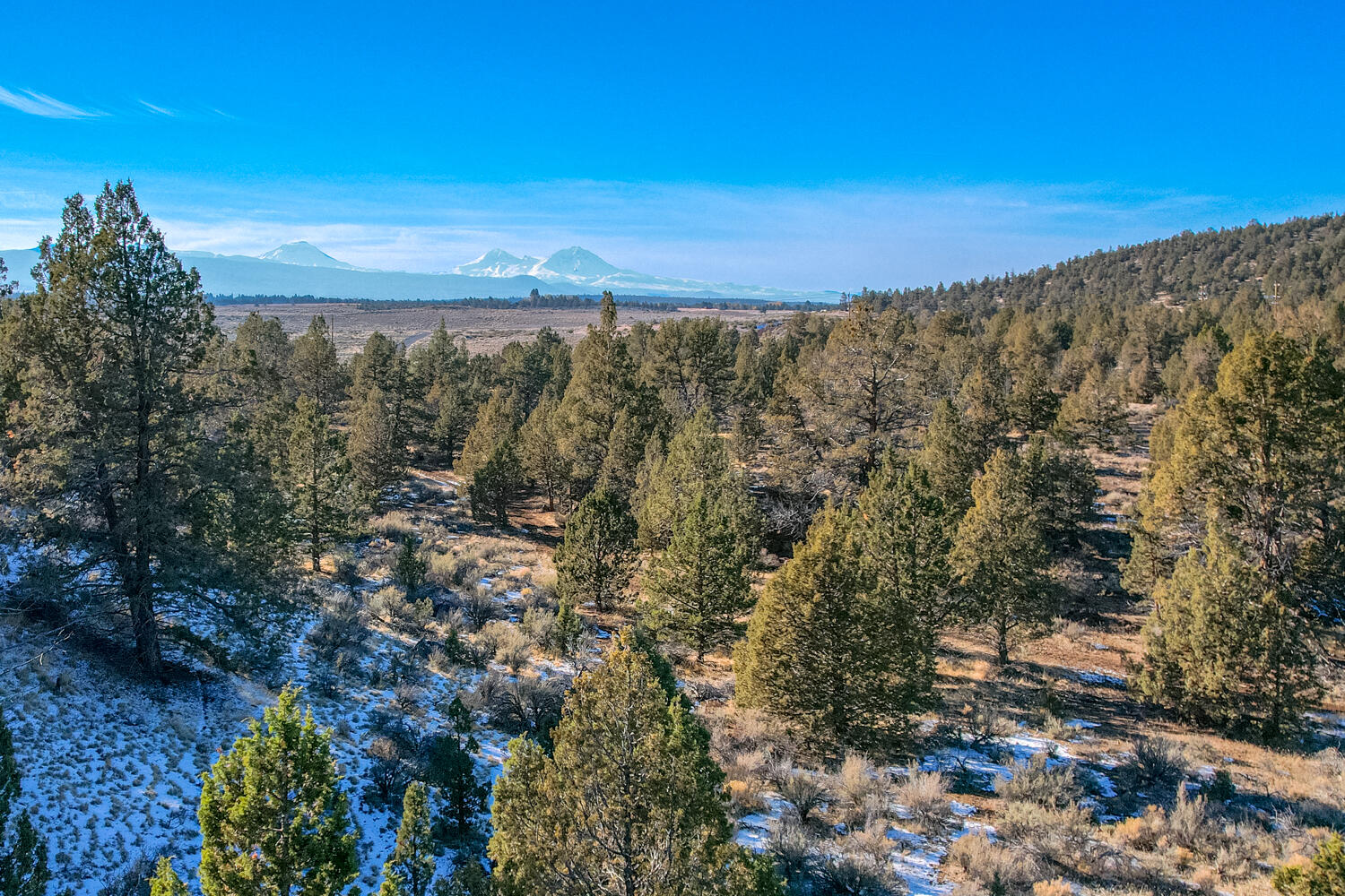64570 Research Road Bend, OR 97703 - Photo 56 of 60 a view of a city with sunset view